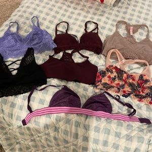 Lot of 7 pink/Victoria secret lace bras. Size medium